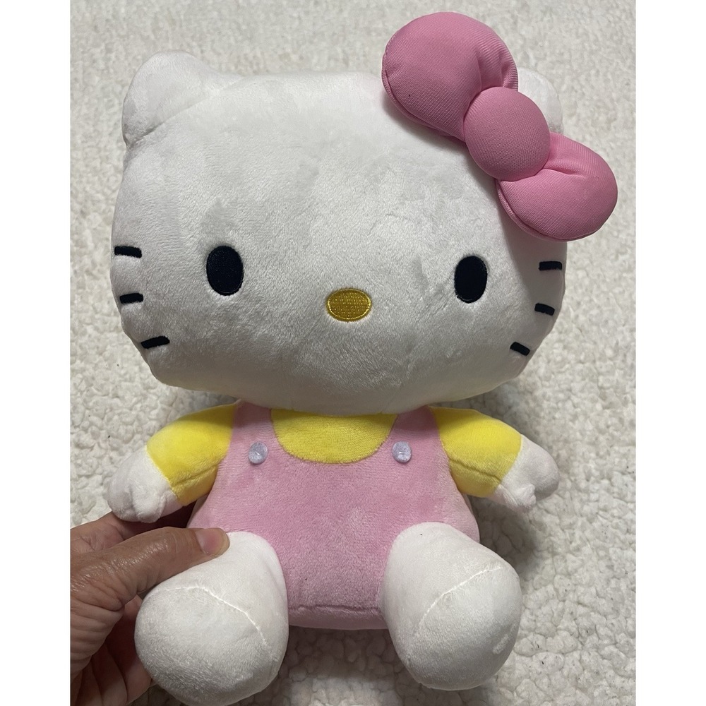 Charming 9.5-Inch Hello Kitty Plush - Authentic Sanrio Cuteness